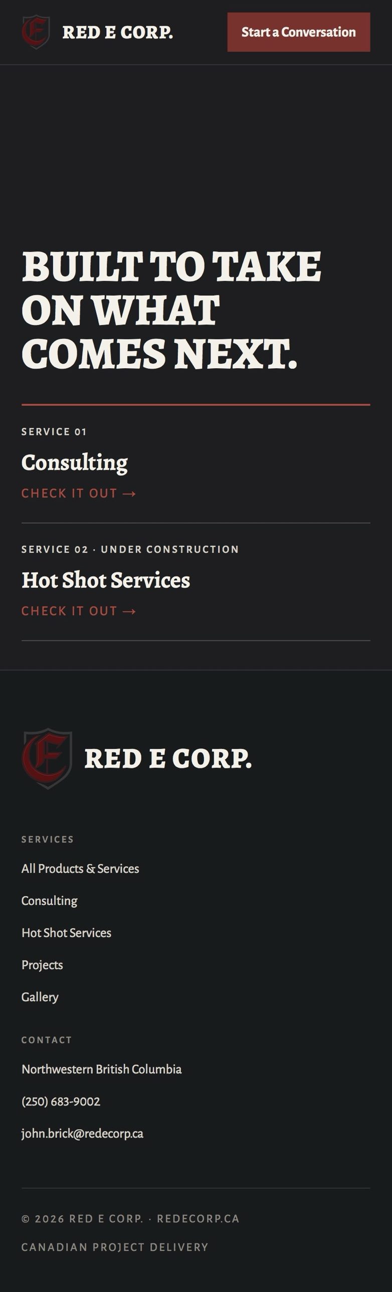 Red E Corp. website on a phone: the headline Built to take on what comes next, the Consulting and Hot Shot Services links, and the footer with contact details
